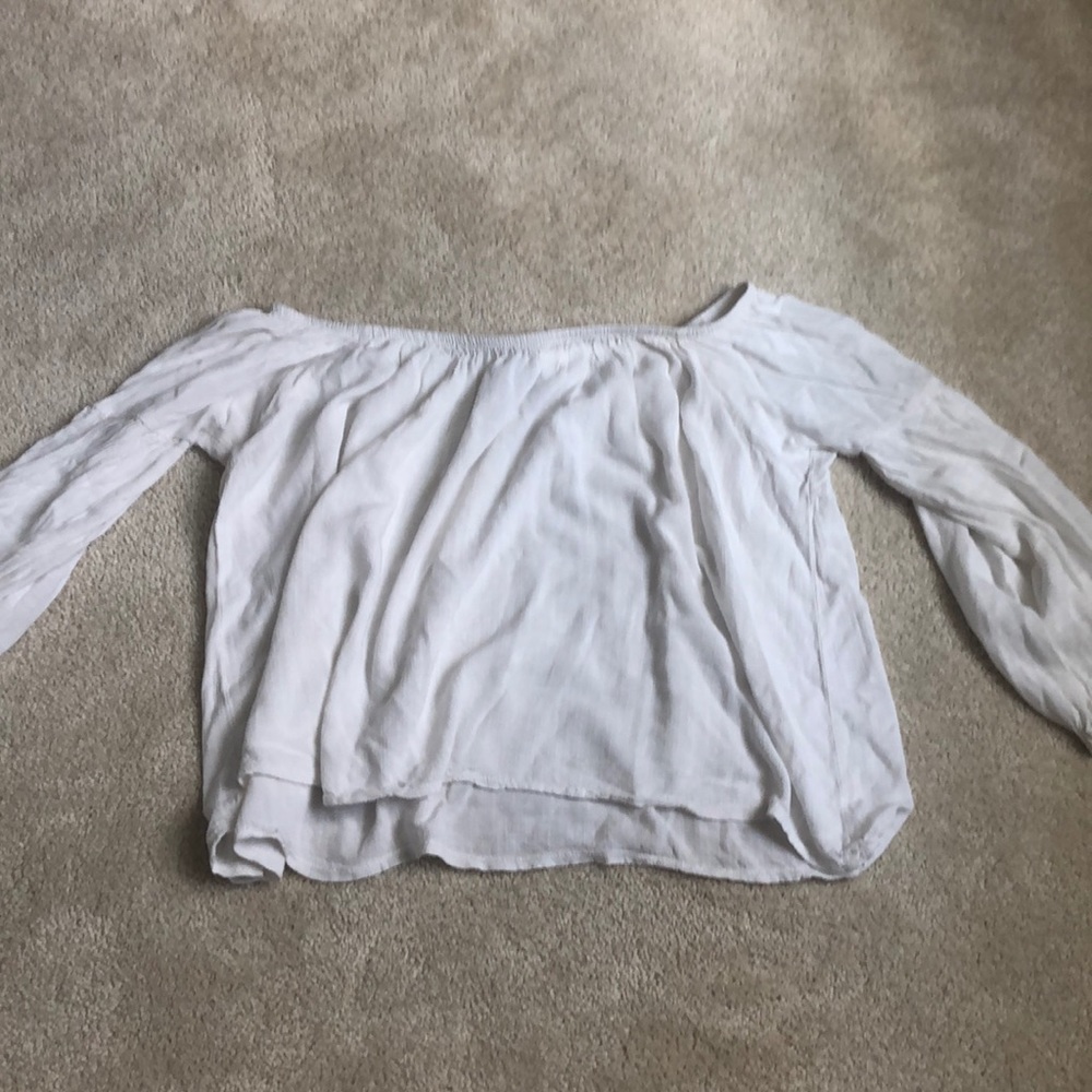 white off-the-shoulder shirt